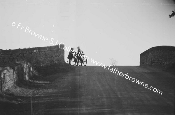 CHILDREN CROSSING KILBRIDE BRIDGE